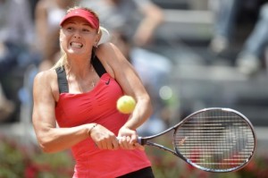 Maria Sharapova durante uma partida de ténis (AFP PHOTO/Filippo Monteforte)