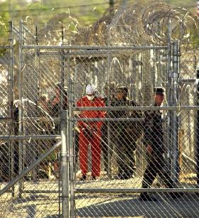 EX-PRESOS DE GUANTÁNAMO ASSINAM ACORDO COM ACNUR — URUGUAI