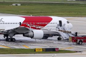 INCÊNDIO EM AVIÃO NUM AEROPORTO DA FLORIDA CAUSA 15 FERIDOS